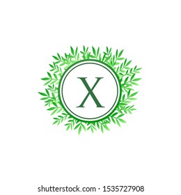 Tropical Green Leaves Vector Logo Letter X. Circle X Letter Design Vector Green Leaves Tropical Logo Icon.