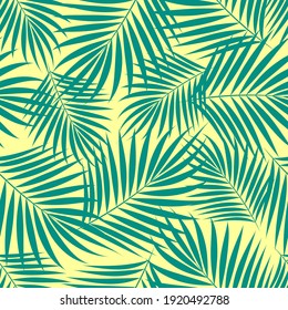 Hojas cortantes verdes tropicales sobre un fondo amarillo.