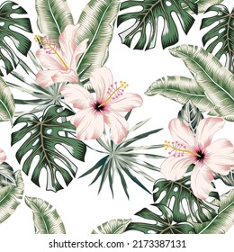 Tropical hibiscus flowers and green palm leaves, white background. Vector seamless pattern. Jungle foliage illustration. Exotic plants. Summer beach floral design. Paradise nature