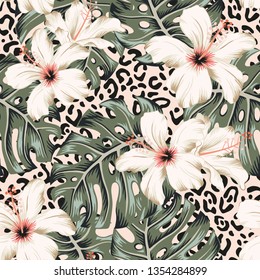 Tropical hibiscus flowers, monstera palm leaves bouquets, animal print pink background. Vector seamless pattern. Jungle foliage illustration. Exotic plants. Summer beach floral design. Paradise nature