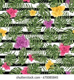 Tropical leafs and flowers seamless pattern background