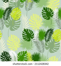 Tropical leaves. Isolated exotic design. Jungle plants. Seamless palm leaf background. Vector image.