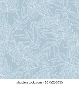 Tropical leaves on blue seamless pattern. Vector illustration.