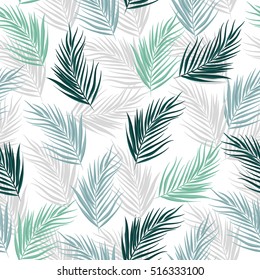 Tropical leaves of palm tree. Seamless pattern. Vector background.