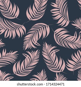 tropical leaves pattern on dark background