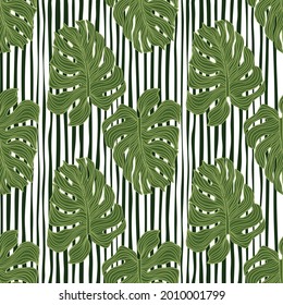 Tropical leaves philodendron plant silhouette seamless pattern on stripes background. Wallpaper with green monstera leaf. Exotic backdrop. Vector design for fabric, textile print, wrapping paper