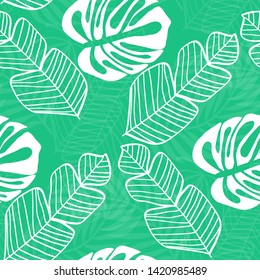 Tropical leaves of plants jungle vector seamless pattern. Exotic floral print for swimsuits, fabrics, wallpapers. Floral background with ethnic leaves and flowers.
