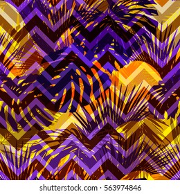 Tropical leaves seamless palm vivid blue color pattern. Vector leaves coconut palm and monstera. Colorful overlay effect exotic plants and leaf coco on a orange yellow palm leaves background.