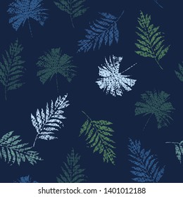 Tropical leaves seamless pattern, blue and green in vector design for fashion,fabric,web,wallpaper on navy blue  background illustration