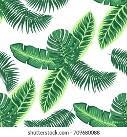 Tropical leaves seamless pattern with green exotic plants. Vector illustration with monstera, palm leaves, floral background  in trendy style.