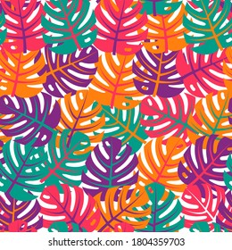 Tropical leaves seamless pattern. Jungle leaves. Colorful exotic background. Flowers poster. Botanical pattern. Wallpaper on web wall and print. Bright summer color background. Vector flat design. 