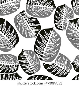 Tropical leaves seamless pattern. Monochrome palm leaf background.
