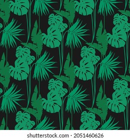 Tropical leaves seamless texture. Retro style pattern with hand drawn monstera, banana, palm. Green silhouettes of leaves on a dark background. Vintage trendy print. For textile or web.
