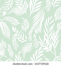 Tropical Leaves Vector seamless repeat pattern with a lime green backgorund.