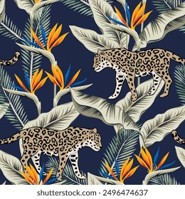 Tropical leopard animal, orange strelitzia flowers, palm leaves, navy blue background. Seamless pattern. Vector illustration. Exotic plants. Summer beach design. Paradise nature