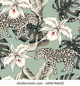 Tropical leopard animal, orchid flowers, palm leaves, green background. Vector seamless pattern. Graphic illustration. Exotic jungle plants. Summer beach floral design. Paradise nature