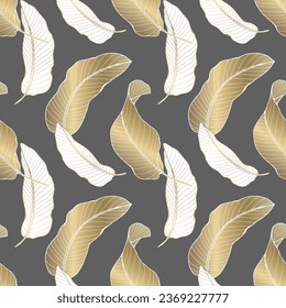 Tropical luxury seamless pattern with gold and white banana leaves on a dark gray background. Vector pattern for children's and women's textiles, wrapping paper, wallpaper, covers.