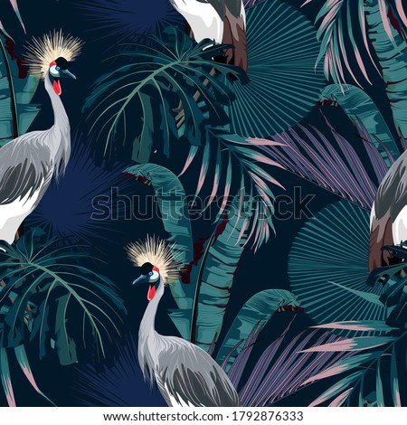 Tropical night vintage wild birds pattern, palm tree, palm leaves and plant floral seamless border black background. Exotic jungle wallpaper.  Japanese crane bird pattern.
