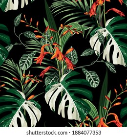 Tropical orange crocosmia  flowers and bright green leaves exotic seamless pattern. Exotic tropical garden on black background.