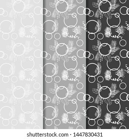 tropical palm leaves and circles seamless floral pattern hand drawn leaves grey and black