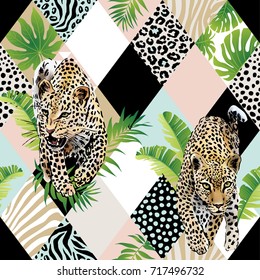 Tropical palm leaves and exotic leopard background. Seamless vector pattern with jungle leaves in trendy style.