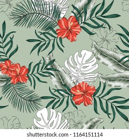 Tropical palm leaves, red hibiscus flowers, green background. Vector seamless pattern. Jungle foliage illustration. Exotic plants. Summer beach floral design. Paradise nature. Graphic 