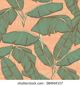 Tropical palm leaves seamless background