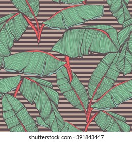 Tropical palm leaves seamless background