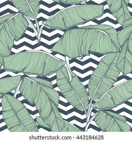 Tropical palm leaves seamless background