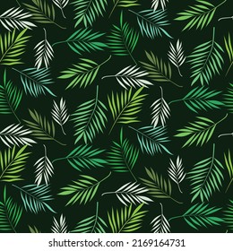Tropical Palm leaves seamless pattern in green and white over dark background. For textile, fabric summer posters and home décor 