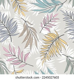 Tropical palm leaves seamless pattern. Colorful botanical leaves pattern on grey background. Can be used for textile, wallpaper, wrapping and home decor.