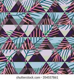 Tropical palm leaves seamless pattern with color triangle ornament