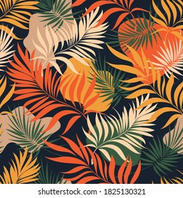 Tropical palm leaves. Seamless vector pattern.