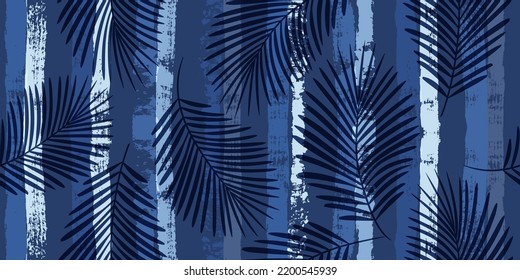Tropical palm leaves seamless vector   pattern. Exotic plant on blue stripes  jungle print.