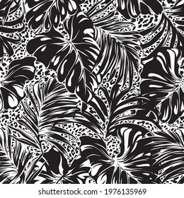 Tropical palm and monstera leaves with leopard skin background abstract vector seamless pattern in black and white
