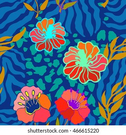 Tropical paradise seamless pattern. Animal print with golden palm leaves and exotic flowers. Ethnic textile collection. Colorful on blue.