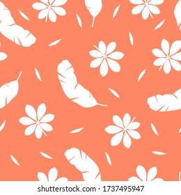 Tropical pattern with different leaves on orange background. Vector illustration of summer. Seamless exotic wallpaper. For web, banners, scrapbooking, printing on fabric, wrapping paper, packaging.