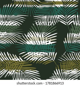 Tropical pattern, Exotic plant on stripes. Green nature jungle print. palm leaves seamless vector floral background. Leaves of palm tree on paint lines. ink brush strokes.