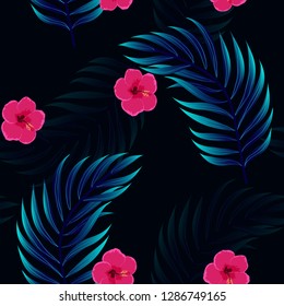 Tropical pattern with hibiscus flowers and leaves. Exotic seamless pattern with tropical leaves. Ethnic Background with Hawaiian flowers and plants.