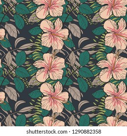 Tropical pattern with hibiscus flowers and leaves on a dark background. Floral background.
