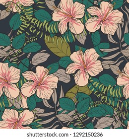 Tropical pattern with hibiscus flowers and leaves on a dark background. Floral background.