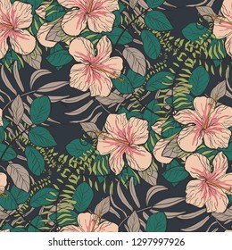 Tropical pattern with hibiscus flowers and leaves on a dark background. Floral background.