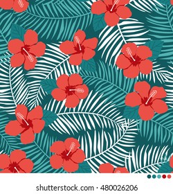 Tropical pattern with hibiscus and palm leaf background