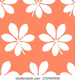 Tropical pattern with large leaves on orange background. Vector illustration of summer. Seamless exotic wallpaper. For web design, banners, scrapbooking, printing on fabric, wrapping paper, packaging.