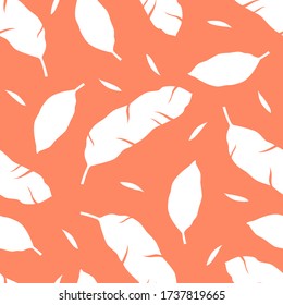 Tropical pattern with leaves on orange background. Vector illustration of summer. Monochrome seamless exotic wallpaper. For web, banners, scrapbooking, printing on fabric, wrapping paper, packaging.