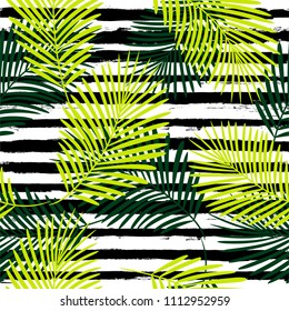 Tropical pattern, palm leaves seamless vector floral background. Exotic plant on stripes illustration. Summer nature jungle print. Leaves of palm tree on paint lines. striped summer ink brush strokes