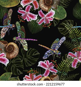 Tropical pattern. Pink orchids flowers, dragonflies and palm leaves seamless background. Fashionable template for design of clothes, textiles. Embroidery. Jungle night