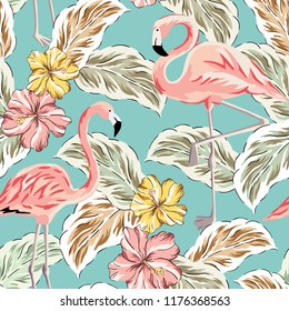 Tropical pink flamingo birds, yellow hibiscus flowers bouquets, palm leaves background. Vector seamless pattern. Jungle illustration. Exotic plants. Summer beach floral design. Paradise nature