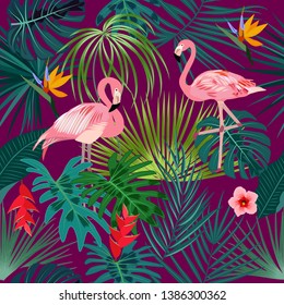 Tropical plant seamless pattern, pink flamingo and tropical leaves of palm tree. Vector background.