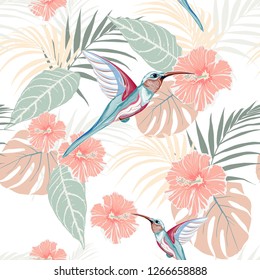 Tropical plants, hibiscus and Colibri bird. Seamless tropical pattern, white background. Backdrop with palm monster leaves, bird and flowers.